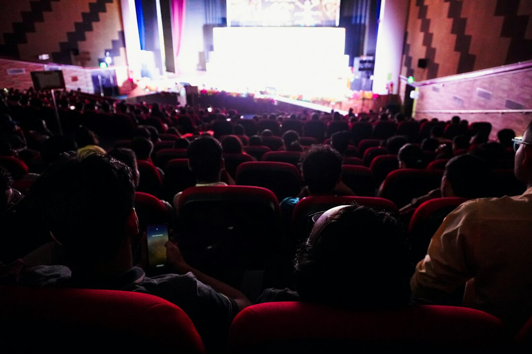 cinema audience watching movie
